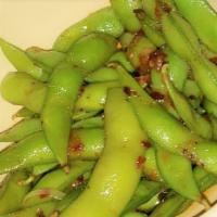 Edamame · Steamed and lightly salted soy beans in a pod.