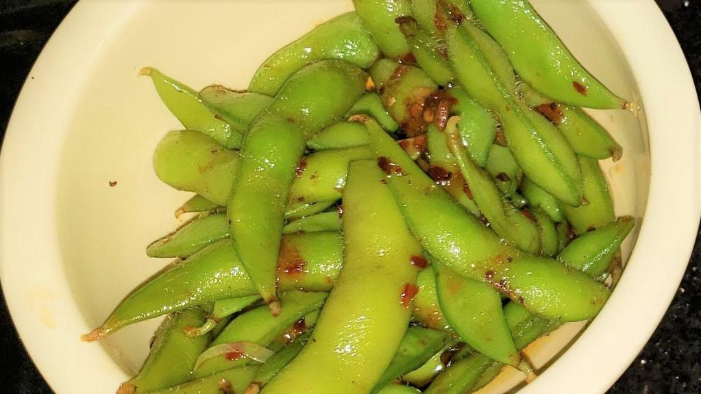Edamame · Steamed and lightly salted soy beans in a pod.