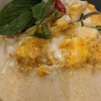 Seafood In Coconut Shell · Spicy. Shrimp, squid, mussel special coconut curry sauce, egg, Thai basil leave, kaffir leav...