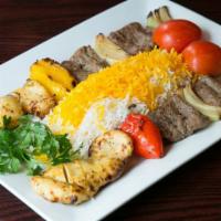 Bakhtiari Kabob · 2 Skewers Combination of tender beef & chicken  thigh, onion and  Sweet bell pepper served w...