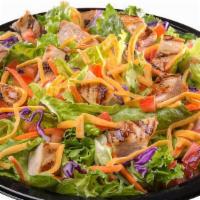 Grilled Chicken Salad · A generous portion of grilled chicken breast served on a crisp blend of Romaine and iceberg ...