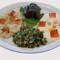 Maza Plate · Hummus and baba ghanoush and tabouli salad, dolma.