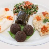 Vegetarian Combo Plate · Hummus and baba ghanoush and tabouli salad and dolma and falafel.
