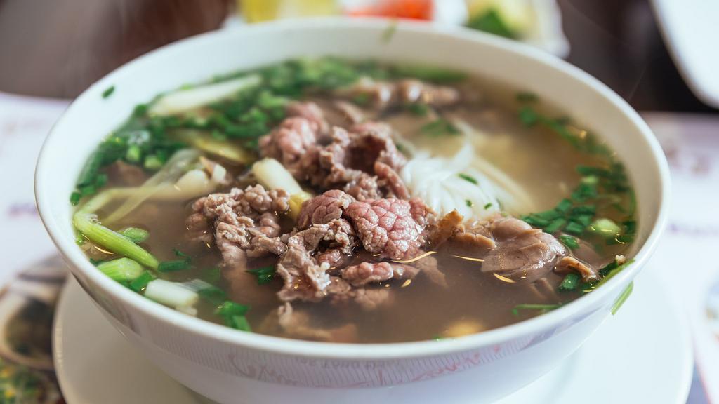 Purple Dragon Pho-Beef Broth Noodle Soup · Purple dragon slowly cooks a flavorful beef broth for hours with a blend of herbs and spices.
