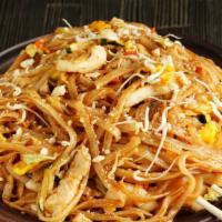Purple Dragon Pad Thai · Spicy, purple dragon starts with stir-fried rice with egg, bean sprouts, green onions, peas ...