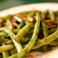 Purple Dragon Beijing Green Beans · Green beans and yellow onions with a brown sauce. Served with rice and roll..