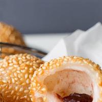Sesame Ball (10 Pcs) · They are made with a sticky rice flour dough, filled with a sweet red bean paste, rolled in ...