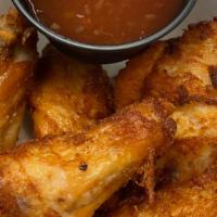 Chicken Wings (5 Pcs) · Fried chicken wings served with sweet chilli sauce