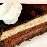 Chocolate Temptation · Chocolate cake filled with chocolate cream hazelnut cream and hazelnut crunch finished with ...