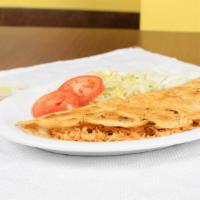 Quesadilla Con Carne Home Made Corn Tortilla · Quesadilla with choice of meat and cheese served with lettuce onions tomatoes and sour cream.