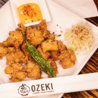 Chicken Karaage · Japanese style fried chicken with shishito, coleslaw.