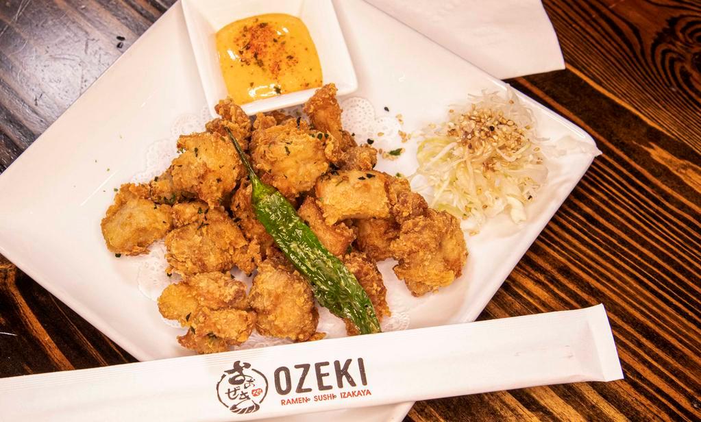 Chicken Karaage · Japanese style fried chicken with shishito, coleslaw.