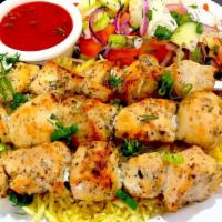 Chicken Breast Shashli ( 8Oz ) · skewered and grilled chicken breast served with fresh salad, tomato sauce, and steamed rice
