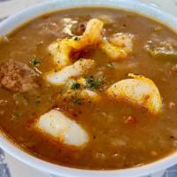 Traditional Gumbo · shrimp, seafood or chicken & sausage with poblano rice;  $7 for cup or $11.50 for bowl