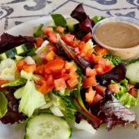 Side Salad · SMALL $6 or LARGE $9 mixed greens, tomatoes, cucumbers with choice of dressing: raspberry vi...