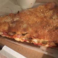 Stuffed Meat Pizza Slice · Stuffed with sausage, hamburger, pepperoni, Canadian bacon and mozzarella cheese. Please all...
