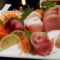 Sushi & Sashimi Combo · Five pieces of sushi, six pieces of sashimi, and spicy tuna roll