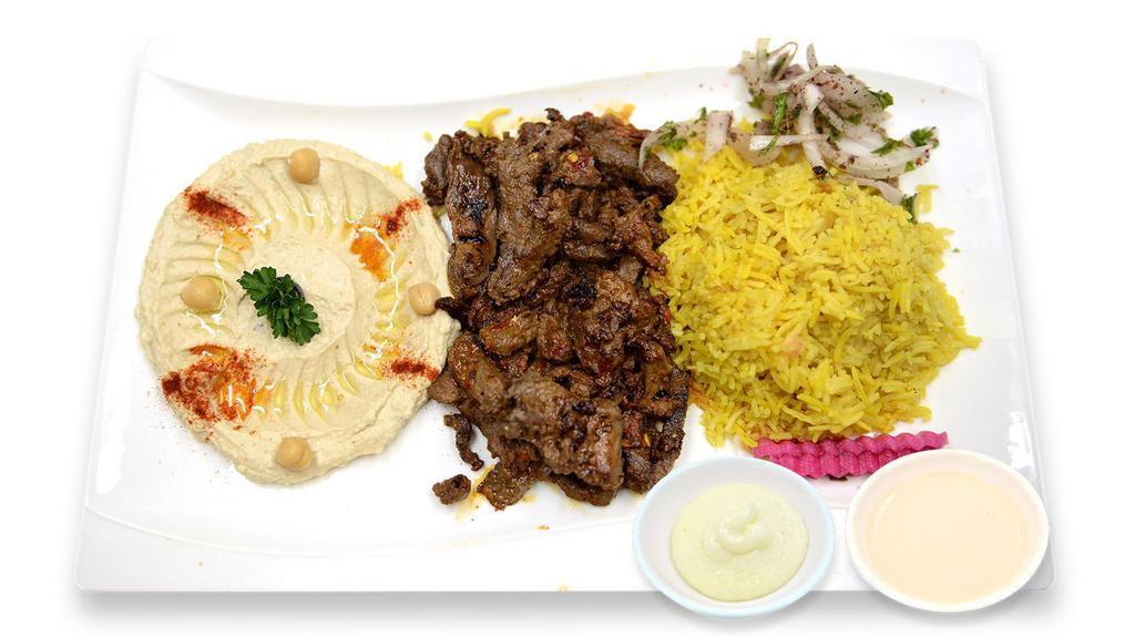 Beef Shawarma Platter · Beef slowly roasted on a spit with a blend of herbs and spices. If you ask, we can make it SPICY!!!!