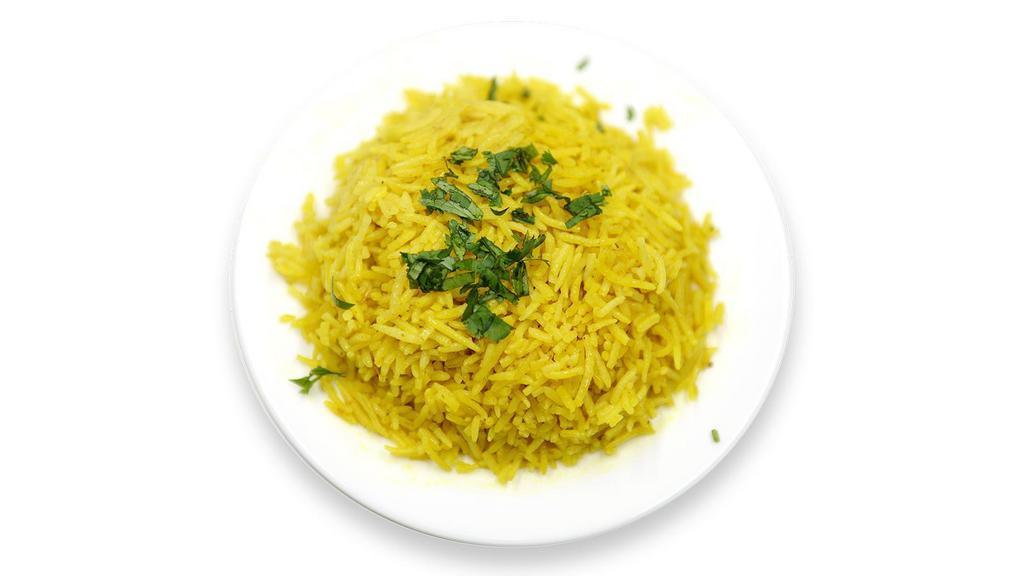 Basmati Rice (Full-16 Oz) · Long grain rice steamed to perfection with a hint of turmeric and other herbs adding to its rich flavors.