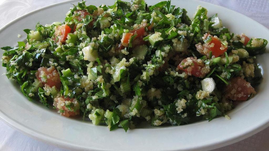 Tabouleh  Full (16 Oz) · Levantine vegetarian salad made of mostly finely chopped parsley with tomatoes, mint, onion, bulgur, and seasoned with olive oil, lemon juice, salt and pepper.