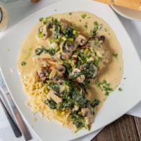 Chicken Florentine · Chicken breast sauteed with green onions, mushrooms and spinach, in white wine cream sauce s...