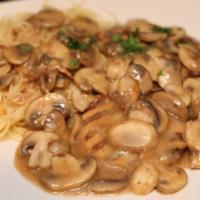 Chicken Marsala · Chicken sauteed with fresh mushrooms and a hint of marinara in a marsala wine sauce served w...