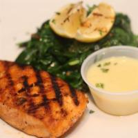 Salmon Sorrento · Atlantic salmon fillet, baked with olive oil and garlic, in a white wine lemon butter sauce,...