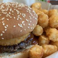 Hickory Burger · Smothered with hickory barbecue sauce topped with onion rings.