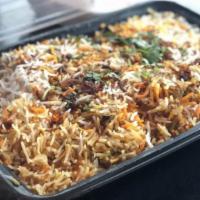 Mutton Biryani · Goat meat marinated in yogurt and traditional spices cooked with basmati rice garnished with...
