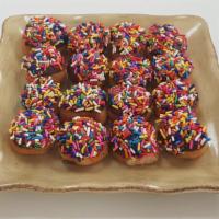 Dozen Sprinkled Donut Holes · Choice of Sprinkled, Strawberry, or Oreo