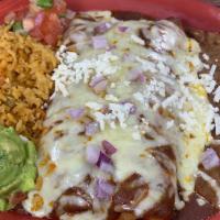 Enchiladas Al Carbon - Chicken · Two enchiladas loaded with tender fajita and topped with chile con carne and grated cheese. ...