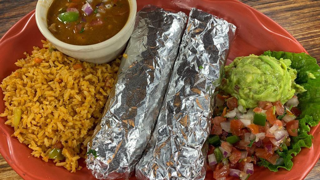 Tacos Al Carbon - Combo · Two delicious fajita tacos hand rolled in homemade flour tortillas. Includes pico de gallo and guacamole.
