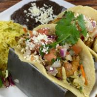 Tacos Del Mar - Shrimp · Two delicious tacos with fresh grilled gulf shrimp in homemade corn tortillas. Loaded with e...