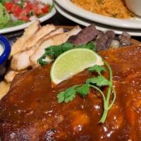 Mazatlan - Beef Fajita · Mazatlan mesquite grilled beef fajitas, half rack of slow smoked baby back ribs, guacamole a...