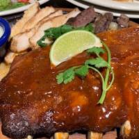 Mazatlan - Chicken Fajita · Mazatlan mesquite grilled chicken fajitas, half rack of slow smoked baby back ribs, guacamol...
