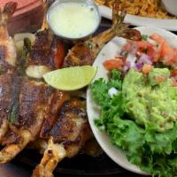 Shrimp Brochette · Eight-ounce fillet gently grilled over mesquite. served with sliced avocado pico de gallo re...