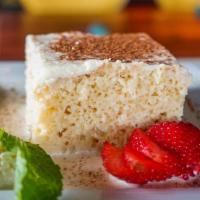 Tres Leches · With fresh strawberries.