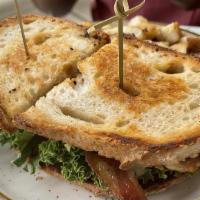 Turkey Bacon Club · Turkey, bacon, lettuce, tomato, and mayo on toasted sourdough bread.