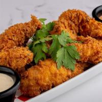 Homestyle Chicken Tenders · Served with peppercorn ranch and Sriracha dipping sauces.