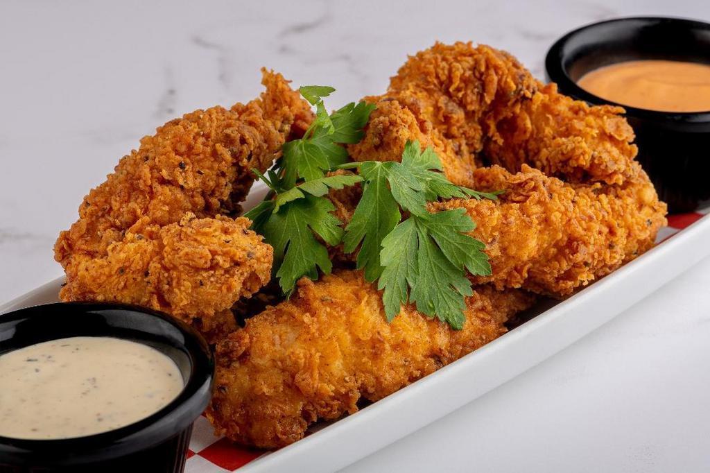 Homestyle Chicken Tenders · Served with peppercorn ranch and Sriracha dipping sauces.