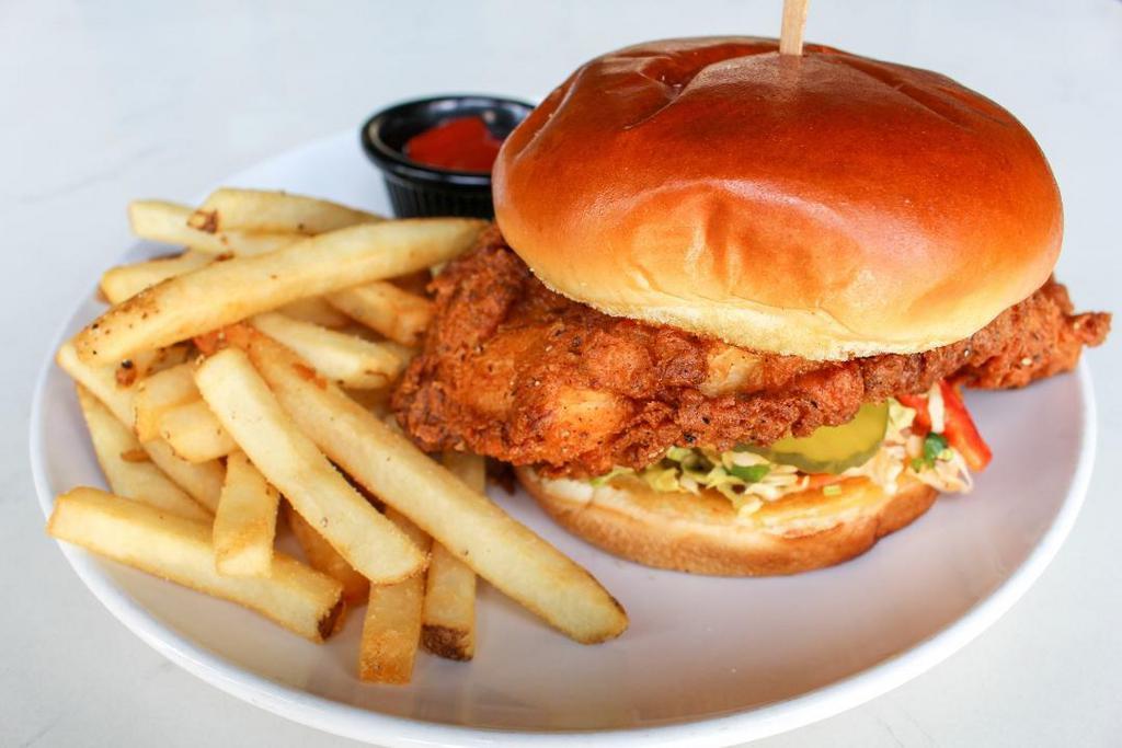 Jewel Spicy Chicken · Marinated with jalapeño and buttermilk, dusted in spicy flour, crispy fried and topped with chipotle aioli, sweet chipotle Napa slaw and dill pickles.