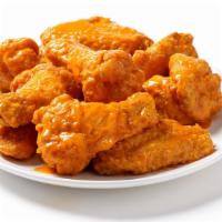 Breaded Wings (10 Pc.) · Hand-breaded, golden & delicious.