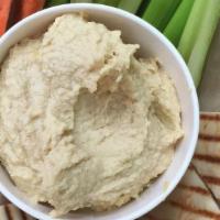 Hummus And Veggies · Generous portion of hummus with celery and carrot sticks