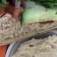 Tuna Sandwich · Tuna, green leaf lettuce, cucumber, tomato, red onion, and low fat mayonnaise. Served with c...