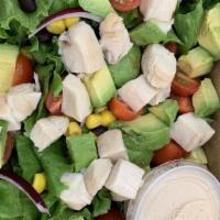 The Southwest Salad · Gluten free. Vegetarian. Green leaf lettuce, grape tomato, black bean, corn, red onion, ched...