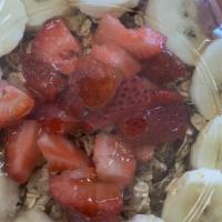 Pitaya Bowl · Base: Chocolate almond milk, strawberry, almond butter
Toppings: Granola, banana, strawberry...