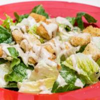 Caesar Salad · Romaine Tossed with our special Caesar dressing, finished with Parmesan and croutons.