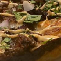 4 Cylinder - Birria Pizza · Authentic detroit style crust and cheese topped with smoked brisket, onions, cilantro, a dri...