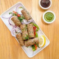 Chicken Seekh Kebab - 12 Piece · Minced chicken flavored with onions and cilantro. NOT SERVED WITH RICE OR NAAN.