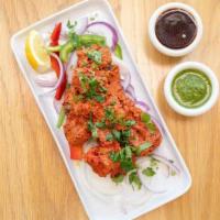 Chicken Angare - 8 Piece · Chicken kebab marinated in a spicy tomato, basil marinade. NOT SERVED WITH RICE OR NAAN.